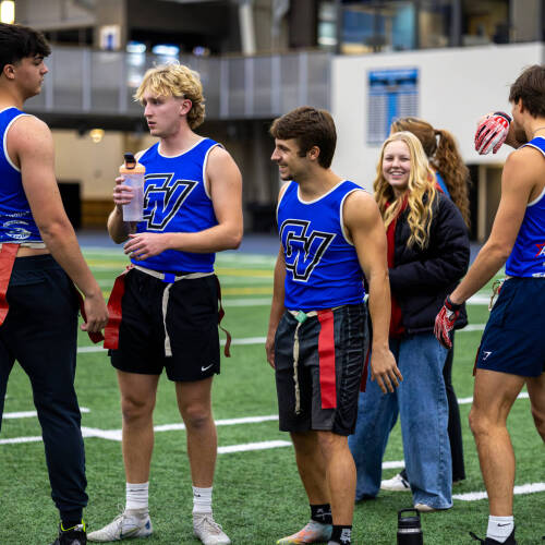students playing flag football